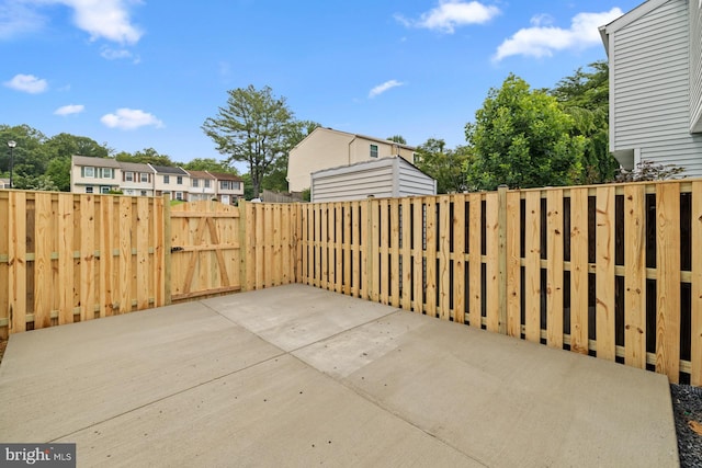8318 Brookvale Ct, Springfield, VA 22153 - view of patio with a gate and a residential view