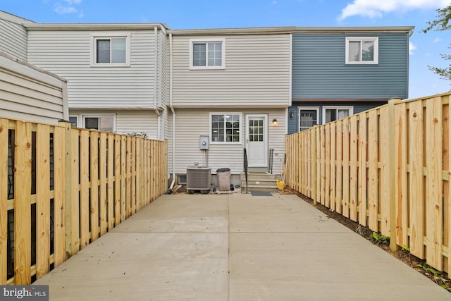 8318 Brookvale Ct, Springfield, VA 22153 - rear view of property with entry steps, a fenced backyard, and a patio