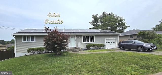 32 Saranac Rd, Hamilton, NJ 08619 - ranch-style house with an attached garage, driveway, solar panels, and a front lawn