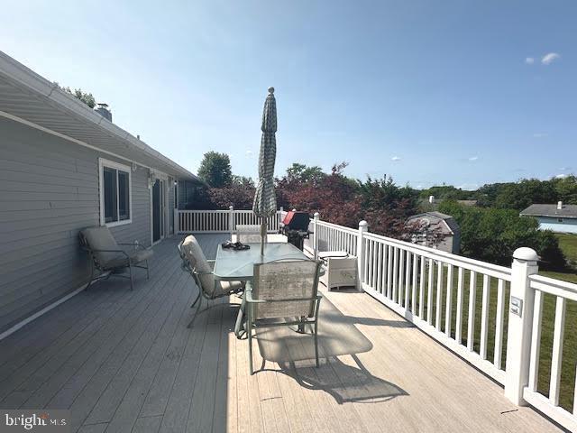 32 Saranac Rd, Hamilton, NJ 08619 - wooden terrace featuring outdoor dining area