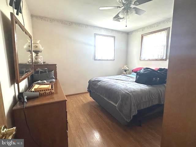 32 Saranac Rd, Hamilton, NJ 08619 - bedroom featuring wood finished floors and a ceiling fan