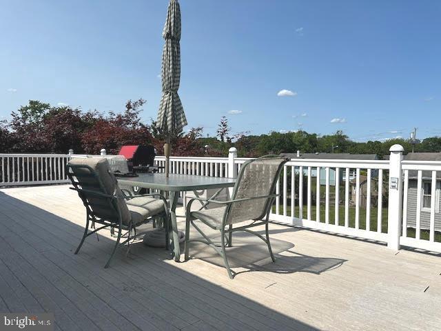 32 Saranac Rd, Hamilton, NJ 08619 - wooden terrace featuring outdoor dining area