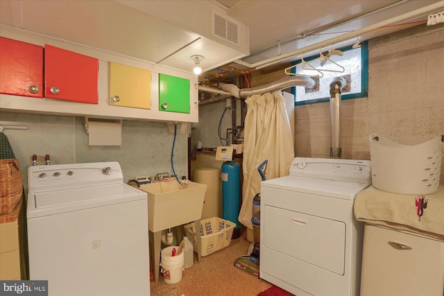 1134 William St, State College, PA 16801 - laundry area featuring cabinet space and washing machine and dryer