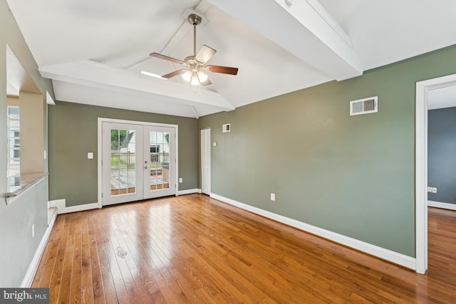 5 Brookfield Rd, Pasadena, MD 21122 - empty room featuring a ceiling fan, french doors, and wood finished floors