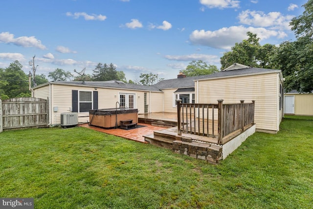 5 Brookfield Rd, Pasadena, MD 21122 - back of property with a hot tub and a wooden deck