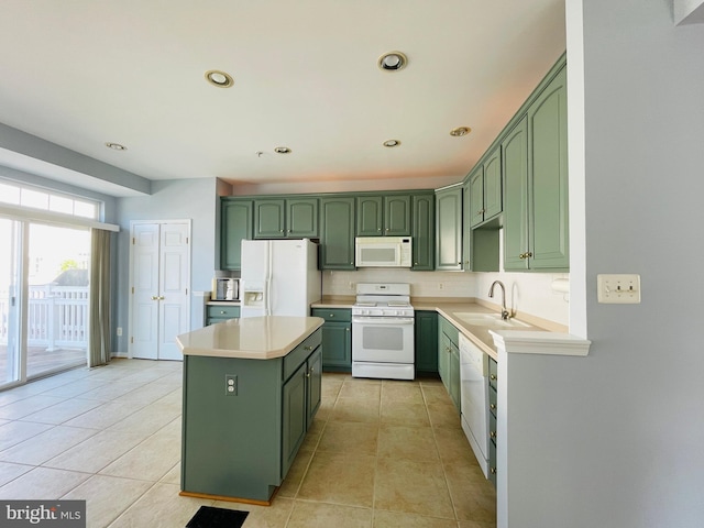 461 Clayhall St, Gaithersburg, MD 20878 - kitchen with green cabinetry, white appliances, light tile patterned floors, light countertops, and recessed lighting