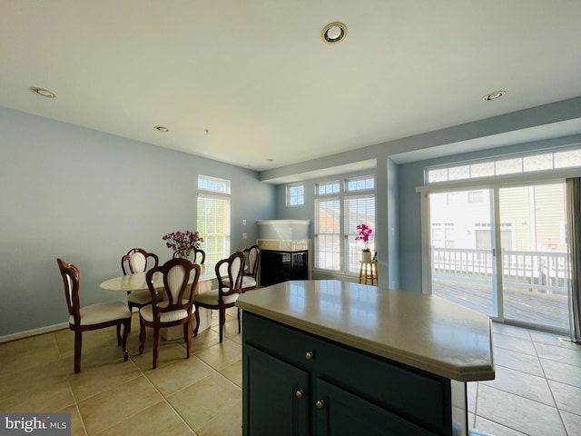 461 Clayhall St, Gaithersburg, MD 20878 - kitchen with light tile patterned floors, a center island, light countertops, and recessed lighting