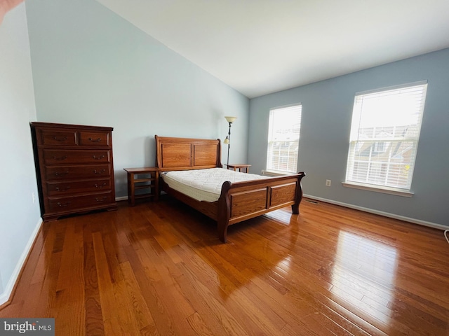 461 Clayhall St, Gaithersburg, MD 20878 - bedroom featuring wood-type flooring and lofted ceiling