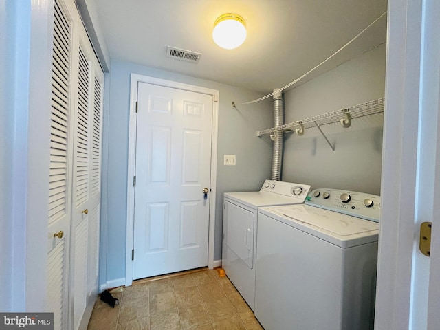 461 Clayhall St, Gaithersburg, MD 20878 - laundry room with washer and clothes dryer and baseboards