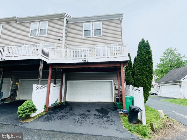461 Clayhall St, Gaithersburg, MD 20878 - view of front of house featuring a garage, driveway, and a carport