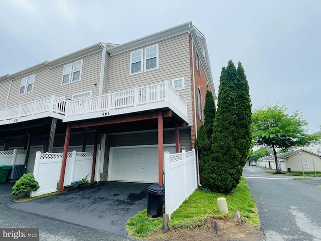 461 Clayhall St, Gaithersburg, MD 20878 - view of front of property with a garage, driveway, and a carport