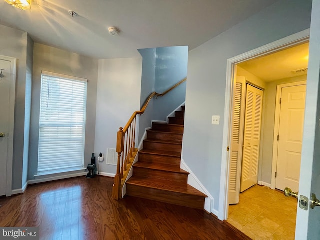 461 Clayhall St, Gaithersburg, MD 20878 - stairs with baseboards and wood finished floors