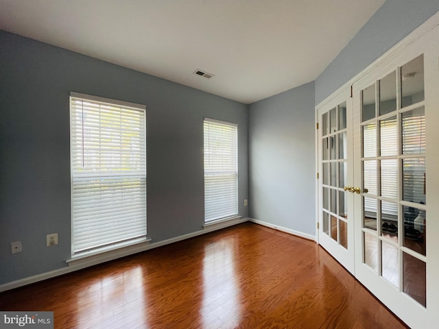 461 Clayhall St, Gaithersburg, MD 20878 - spare room with french doors and wood finished floors