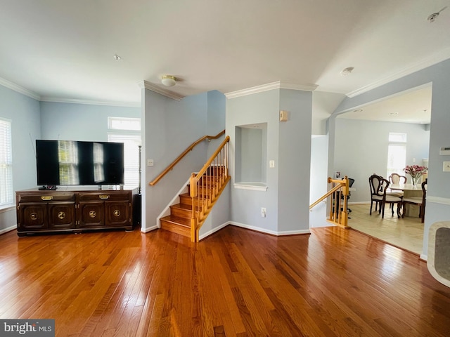 461 Clayhall St, Gaithersburg, MD 20878 - living area with hardwood / wood-style floors, crown molding, healthy amount of natural light, and stairs