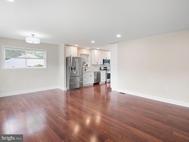 105 Bette Rd, Wilmington, DE 19803 - unfurnished living room featuring dark wood finished floors and recessed lighting