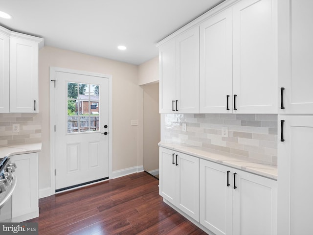 105 Bette Rd, Wilmington, DE 19803 - kitchen with dark wood finished floors, gas range, tasteful backsplash, light stone countertops, and recessed lighting