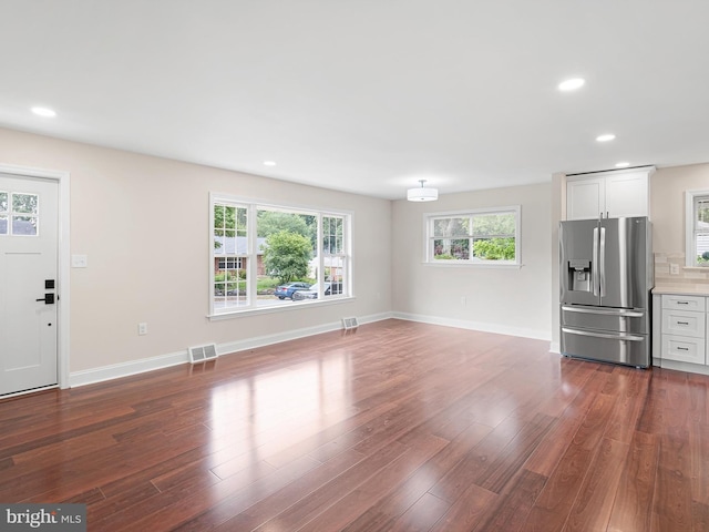 105 Bette Rd, Wilmington, DE 19803 - unfurnished living room with dark wood-style floors and recessed lighting