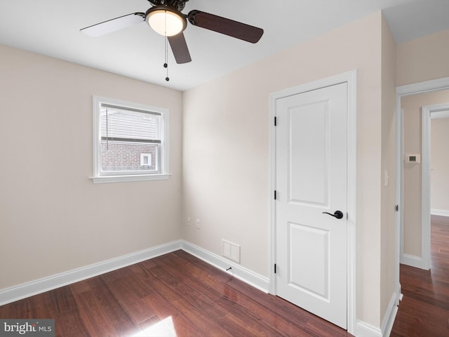 105 Bette Rd, Wilmington, DE 19803 - unfurnished bedroom with dark wood-style floors and ceiling fan