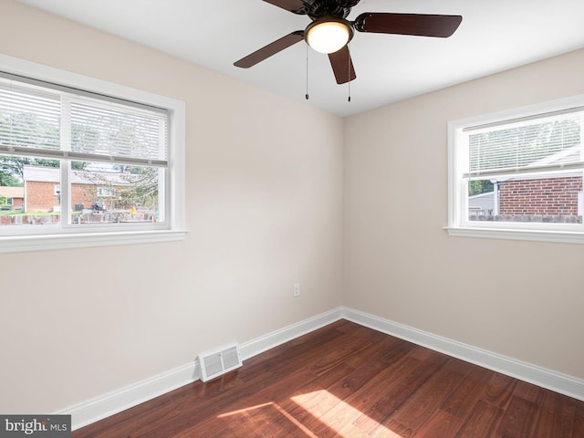 105 Bette Rd, Wilmington, DE 19803 - empty room featuring healthy amount of natural light, dark wood-style floors, and a ceiling fan