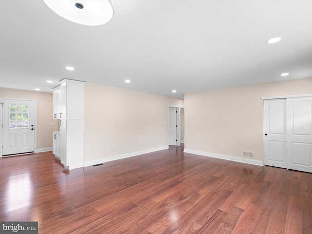 105 Bette Rd, Wilmington, DE 19803 - unfurnished living room featuring dark wood finished floors and recessed lighting