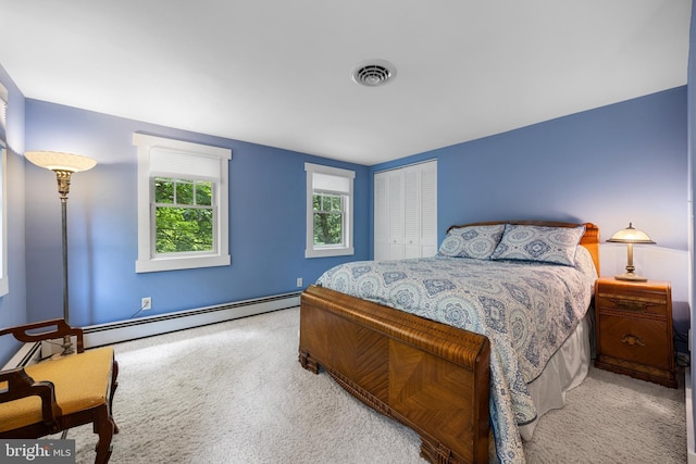 136 Lambs Rd, Sewell, NJ 08080 - carpeted bedroom featuring baseboard heating and a closet