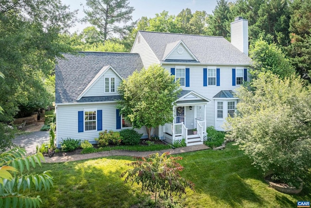 1500 Honeysuckle Ln, Charlottesville, VA 22902 - colonial inspired home featuring a chimney, a front yard, and a shingled roof