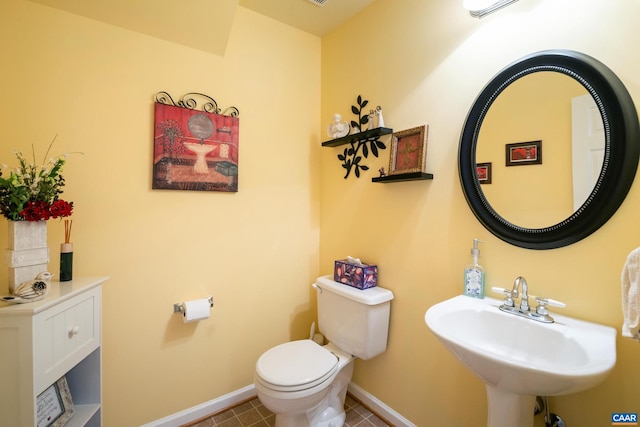 1500 Honeysuckle Ln, Charlottesville, VA 22902 - half bathroom with baseboards and tile patterned floors