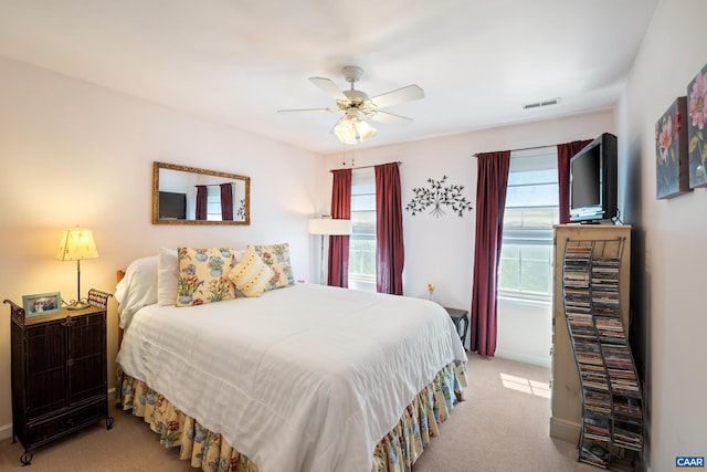 1500 Honeysuckle Ln, Charlottesville, VA 22902 - carpeted bedroom featuring multiple windows and a ceiling fan