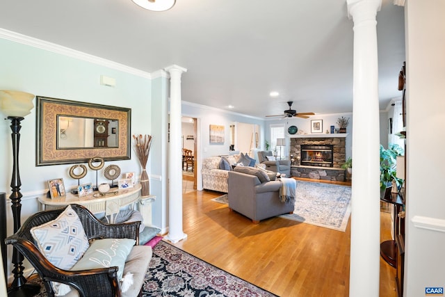 1500 Honeysuckle Ln, Charlottesville, VA 22902 - living area featuring ornate columns, ornamental molding, a ceiling fan, wood finished floors, and a fireplace