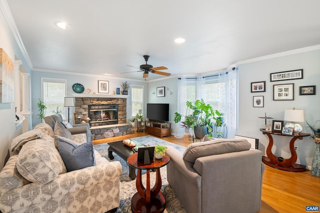 1500 Honeysuckle Ln, Charlottesville, VA 22902 - living area featuring ceiling fan, ornamental molding, healthy amount of natural light, a fireplace, and wood finished floors