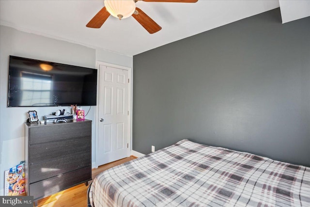 8255 Longpoint Rd, Baltimore, MD 21222 - bedroom featuring light wood-type flooring and ceiling fan