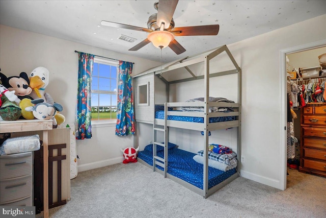 8255 Longpoint Rd, Baltimore, MD 21222 - bedroom featuring carpet, a walk in closet, and ceiling fan