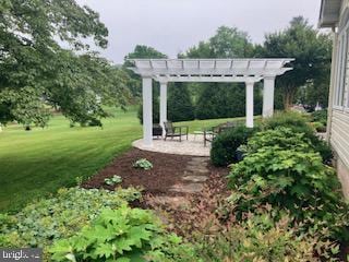 15861 Union Chapel Rd, Woodbine, MD 21797 - view of grassy yard with a pergola and a garden