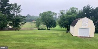 15861 Union Chapel Rd, Woodbine, MD 21797 - view of green lawn with an outbuilding and a garage