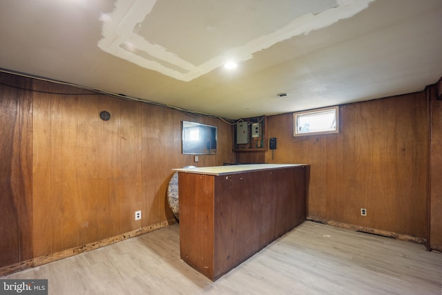 2301 Airacobra St, Levittown, PA 19057 - indoor dry bar featuring light wood-style flooring and wooden walls