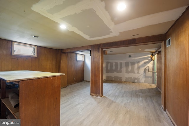 2301 Airacobra St, Levittown, PA 19057 - below grade area with wooden walls and light wood-type flooring