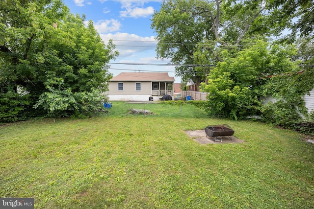 2301 Airacobra St, Levittown, PA 19057 - view of grassy yard with an outdoor fire pit