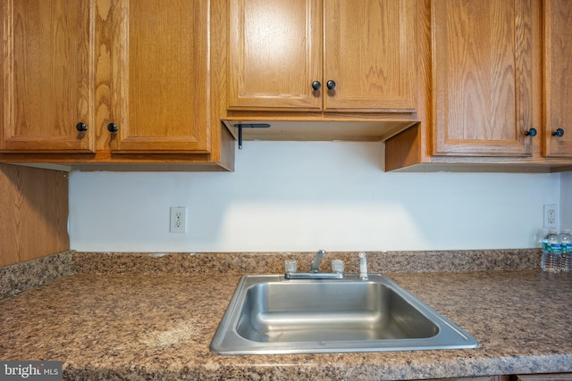 2301 Airacobra St, Levittown, PA 19057 - kitchen with a sink and dark countertops