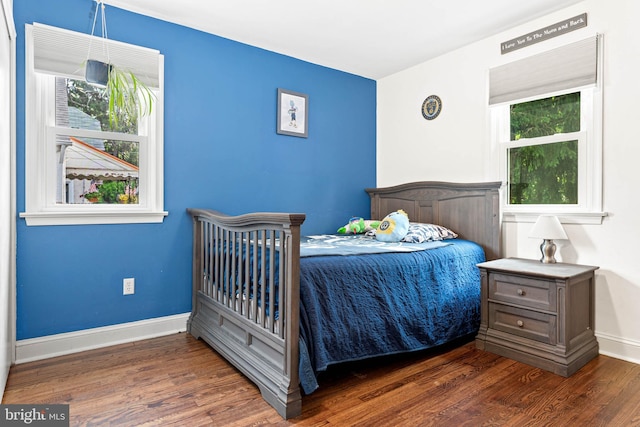 101 Ash Rd, Wallingford, PA 19086 - bedroom with wood finished floors and baseboards