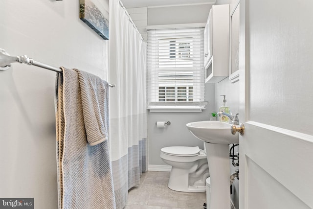 101 Ash Rd, Wallingford, PA 19086 - full bath featuring toilet and baseboards