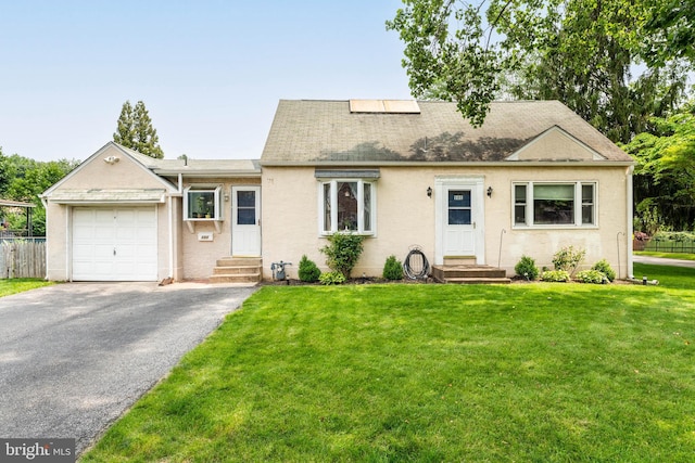 101 Ash Rd, Wallingford, PA 19086 - view of front of house featuring entry steps, driveway, a garage, roof with shingles, and stucco siding