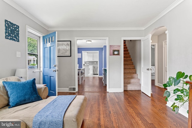 101 Ash Rd, Wallingford, PA 19086 - bedroom with wood finished floors, crown molding, and arched walkways