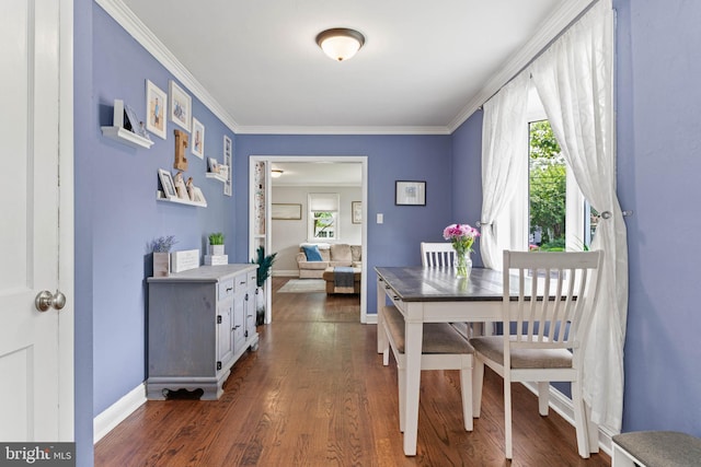 101 Ash Rd, Wallingford, PA 19086 - dining area featuring dark wood-type flooring and crown molding