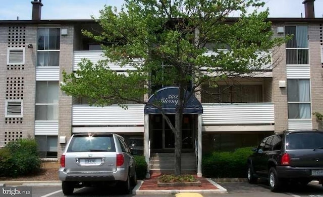 5606 Bismach Dr Unit 104, Alexandria, VA 22312 - view of property with uncovered parking
