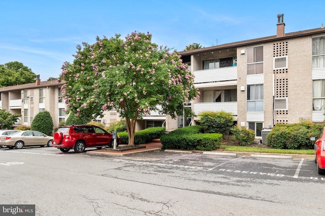 5606 Bismach Dr Unit 104, Alexandria, VA 22312 - view of building exterior with uncovered parking