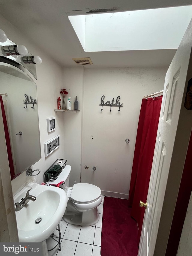 129 Laureba Ave, Stratford, NJ 08084 - bathroom featuring tile patterned floors and a shower with curtain