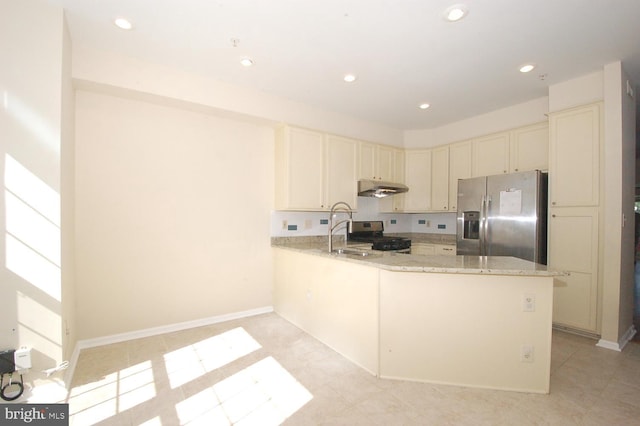 12013 Panthers Ridge Dr, Germantown, MD 20876 - kitchen featuring stainless steel appliances, under cabinet range hood, a peninsula, light stone counters, and recessed lighting
