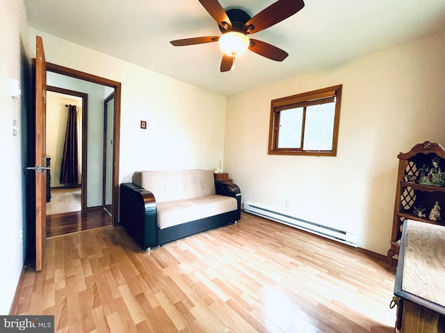 183 Radcliff Rd, Bushkill, PA 18324 - sitting room with a baseboard heating unit, light wood-style floors, and ceiling fan