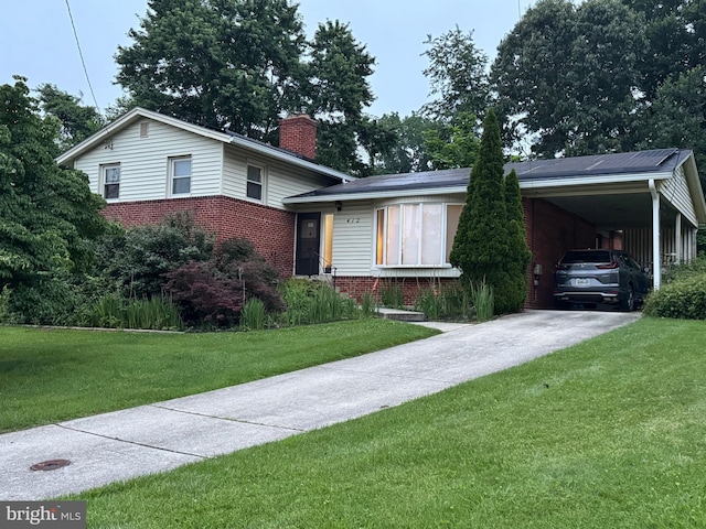 412 Neale Ct, Silver Spring, MD 20901 - tri-level home with brick siding, concrete driveway, a chimney, and a front lawn