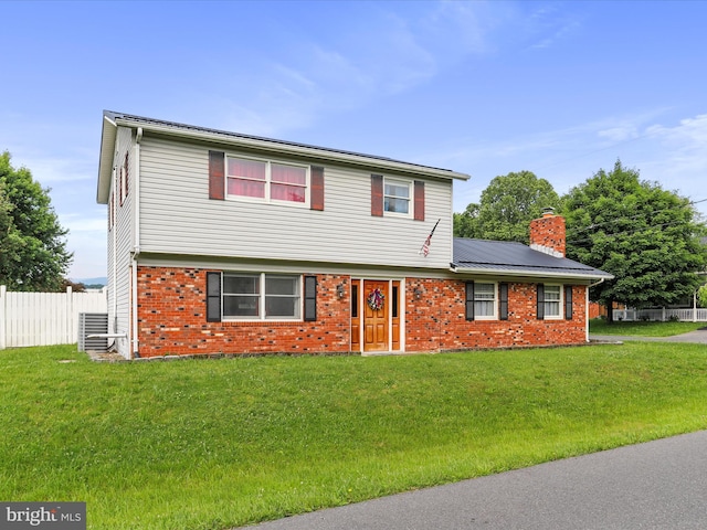 15 Nightingale St, Keyser, WV 26726 - colonial-style house with brick siding and a chimney